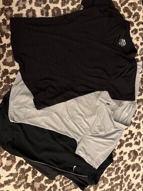 3 Women’s golf tops. 2 Slazenger short sleeve, 1 Nike sleeveless tank top